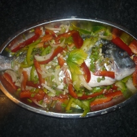 Oven Baked Grey Snapper with Caribbean sauce, Turks and Caicos Islands.